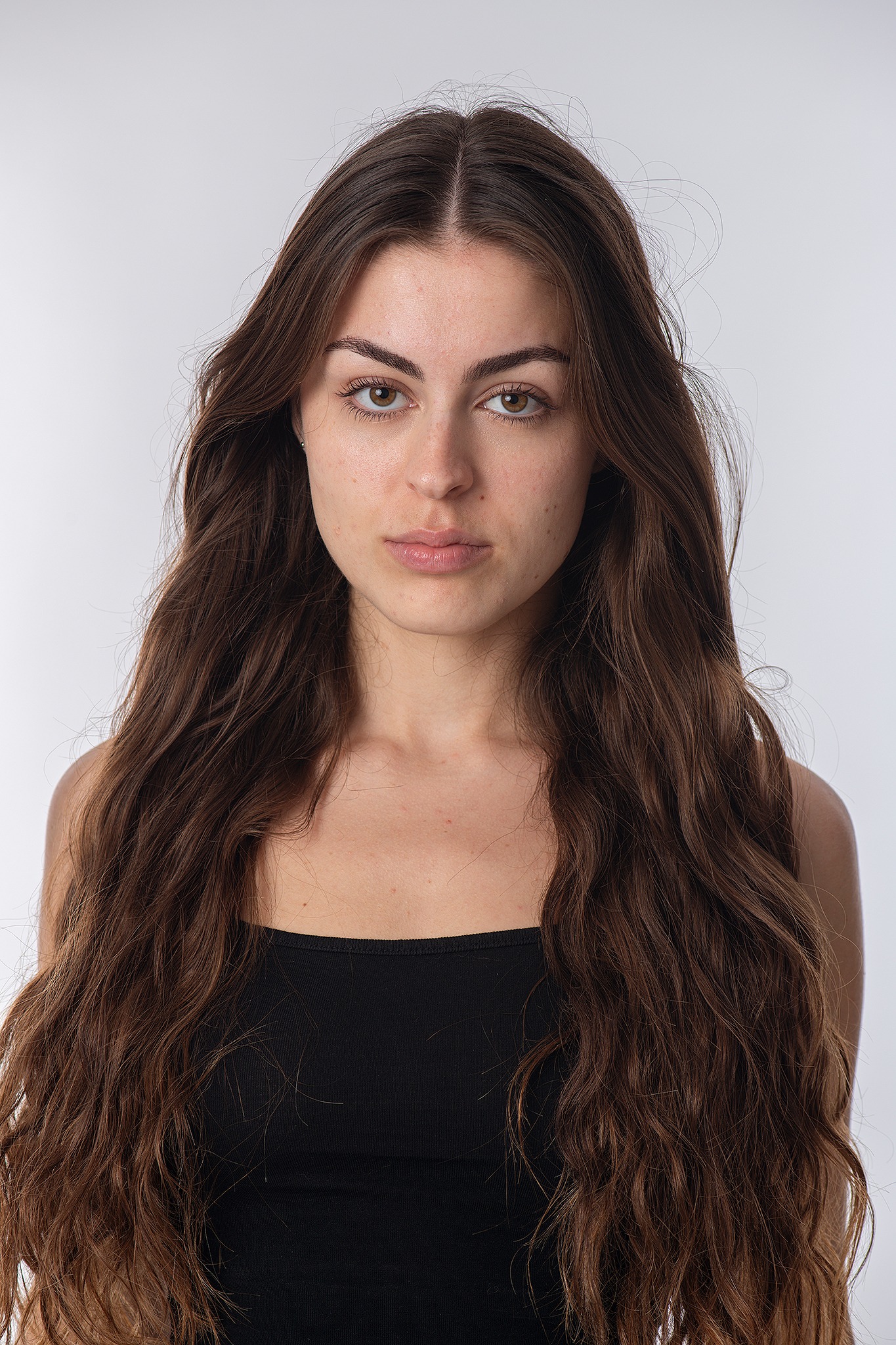 Headshot natural con cabello suelto